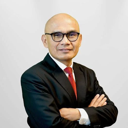 H.E. Dr Desra Percaya*